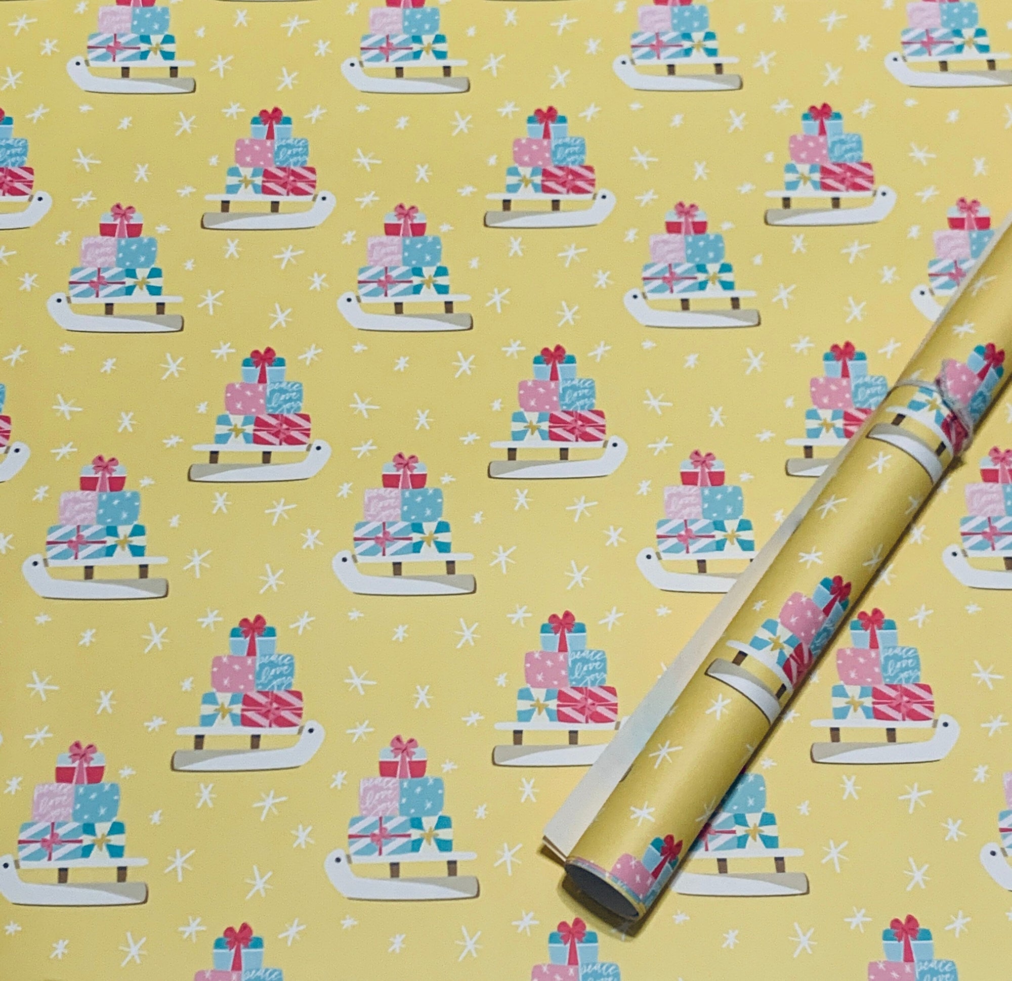 Yellow Christmas Sled Wrapping Paper Alexander&#39;s 