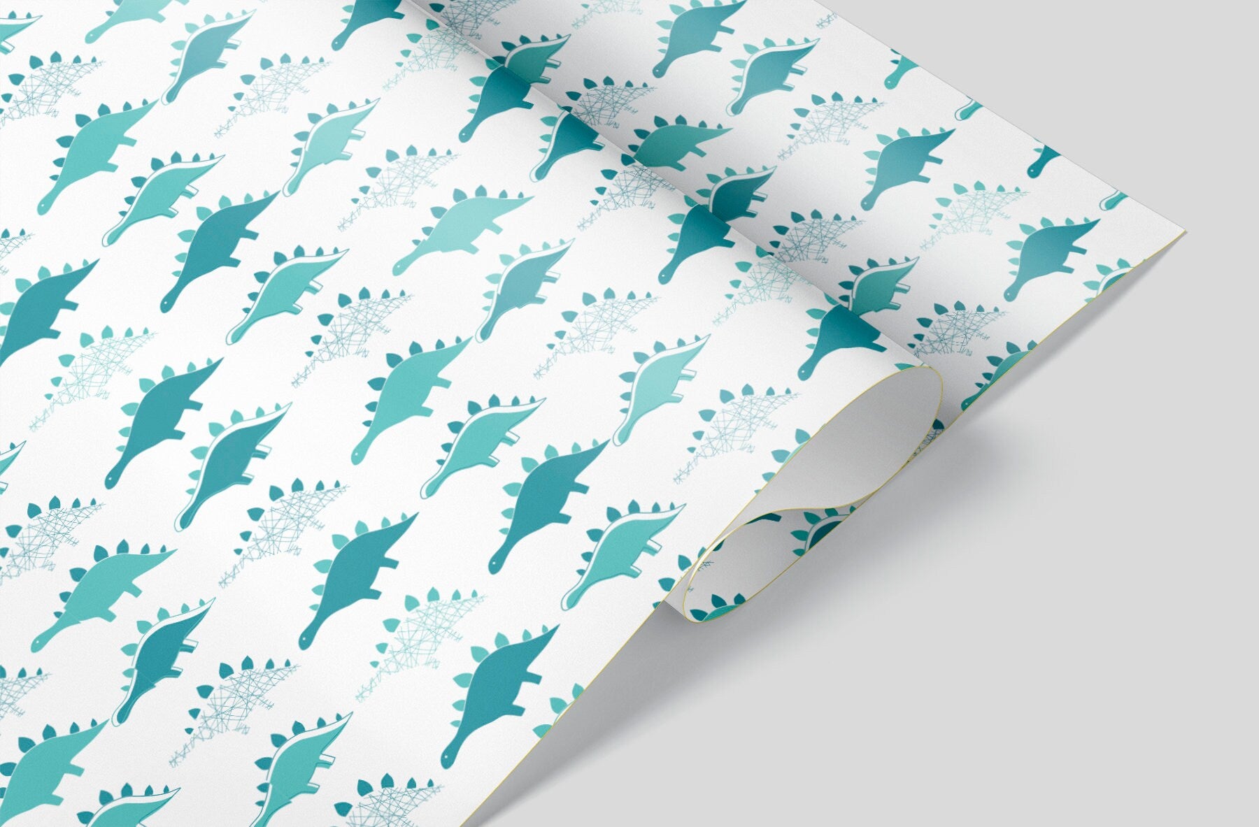 white wrapping paper with blue stegosaurus dinosaurs
