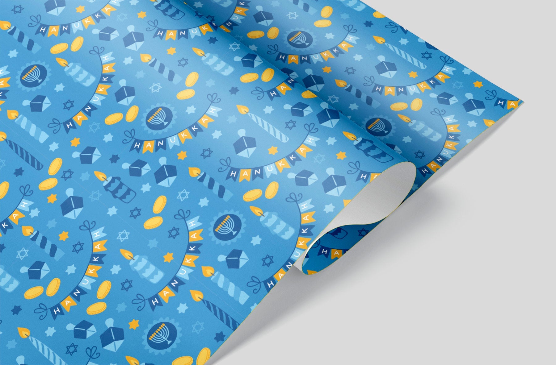 Blue Hanukkah wrapping paper with Candles, menorah, dreidels and the star of david