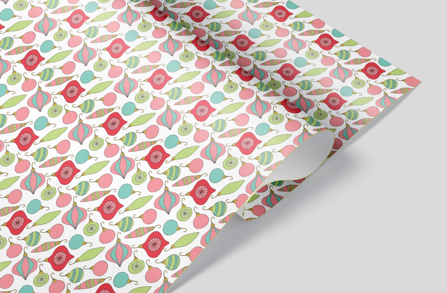Whoville Style Christmas Ornaments diagonally printed on a white sheet of wrapping paper 